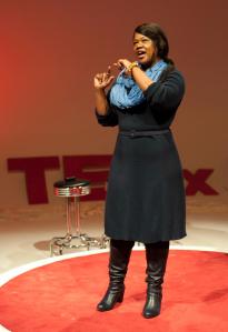 Valaida presenting during TEDxCLT 2013, photography by Deborah Triplett